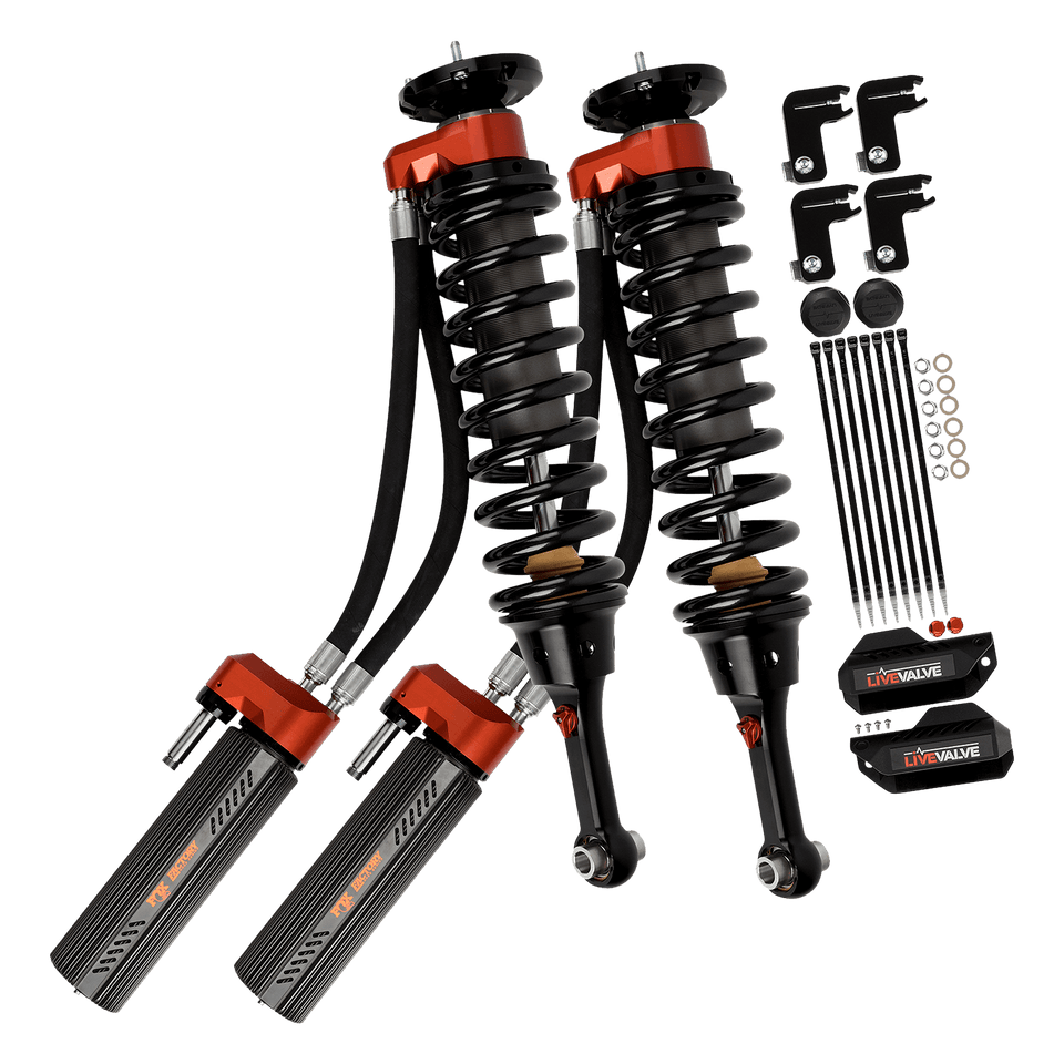 https://serenity-foxfactory.asset.akeneo.cloud/fox_asset_family/media/883_06_153_fox_truck_factory_race_live_valve_shocks_op_1600x1600.png