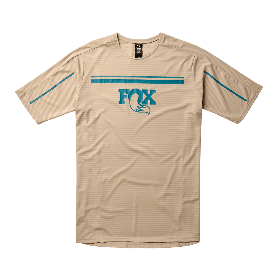 https://serenity-foxfactory.asset.akeneo.cloud/fox_asset_family/media/SSG_Apparel_Hightail_SS_Jersey___Dune___Front.png